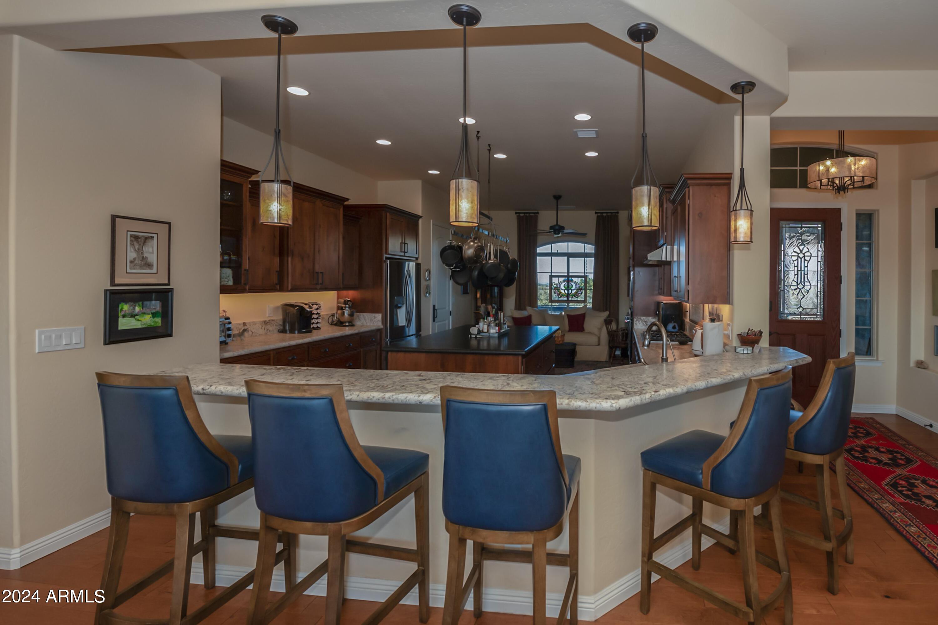 11445 Arrow Ranch Road Prescott, AZ 86305 - Photo 10 of 38 Breakfast Bar to Kitchen