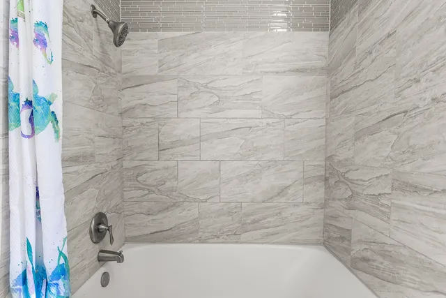 a bathroom with a bathtub