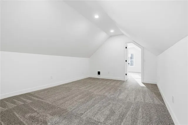 a view of a room with an empty space