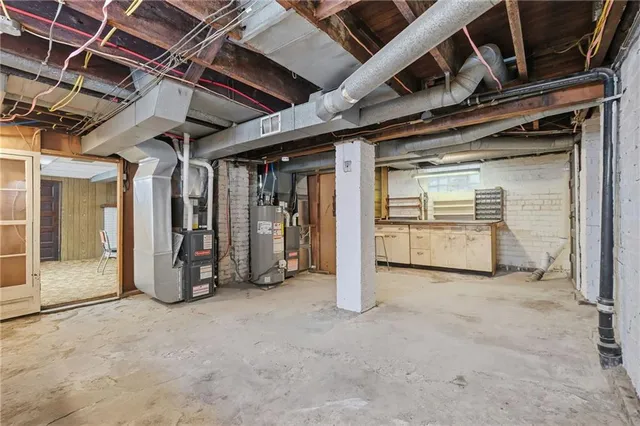 a view of an empty room with closet