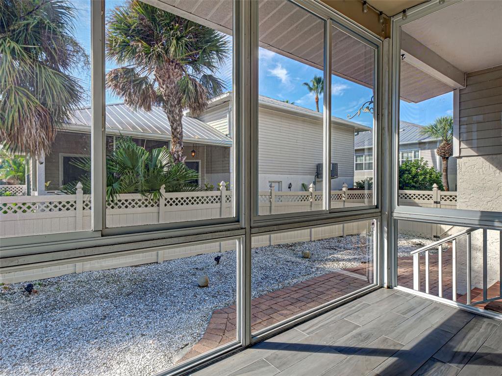 1801 Highland Road Osprey, FL 34229 - Photo 30 of 40 a view of a door of a house with a porch