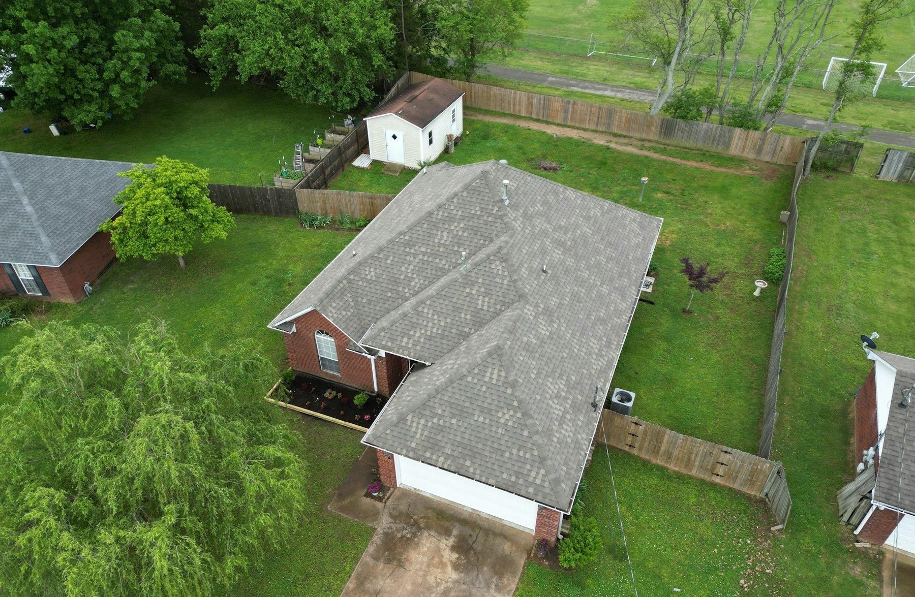 611 Gettysburg Drive Jackson, TN 38305 - Photo 6 of 19 an aerial view of a house with a garden and yard