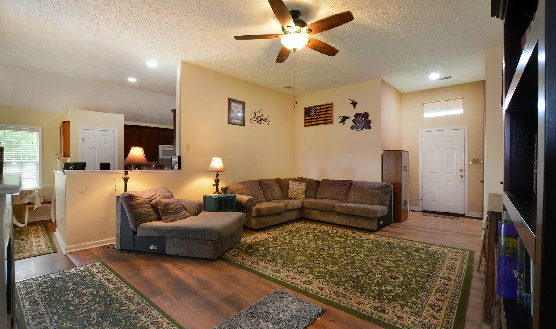 611 Gettysburg Drive Jackson, TN 38305 - Photo 8 of 19 a living room with furniture and a flat screen tv