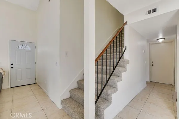 a view of an entryway with staircase
