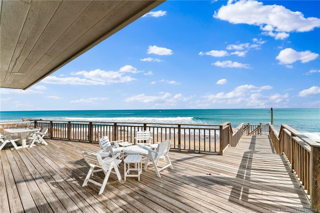 777 Southeast MacArthur Boulevard Stuart, FL 34996 - Photo 12 of 46 a view of a balcony with chairs