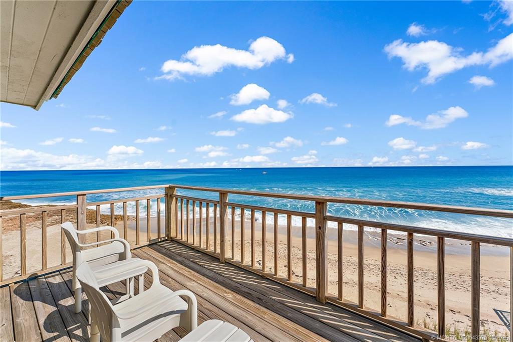 777 Southeast MacArthur Boulevard Stuart, FL 34996 - Photo 22 of 46 a view of a balcony with wooden floor