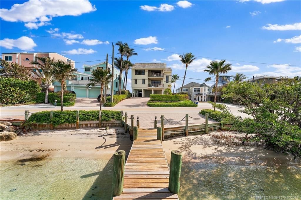 777 Southeast MacArthur Boulevard Stuart, FL 34996 - Photo 4 of 46 a park view with a seating space