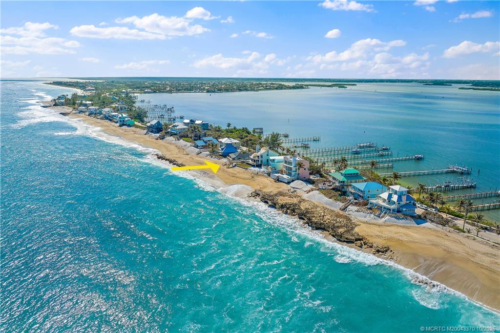 777 Southeast MacArthur Boulevard Stuart, FL 34996 - Photo 46 of 46 a view of a lake with a city