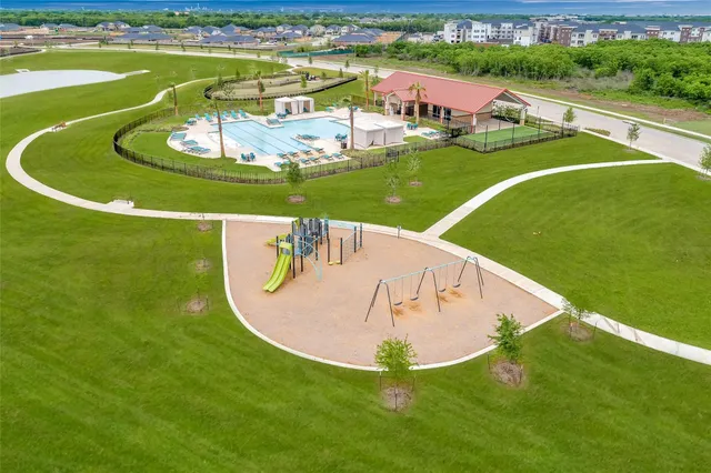 an aerial view of a house with a ocean view