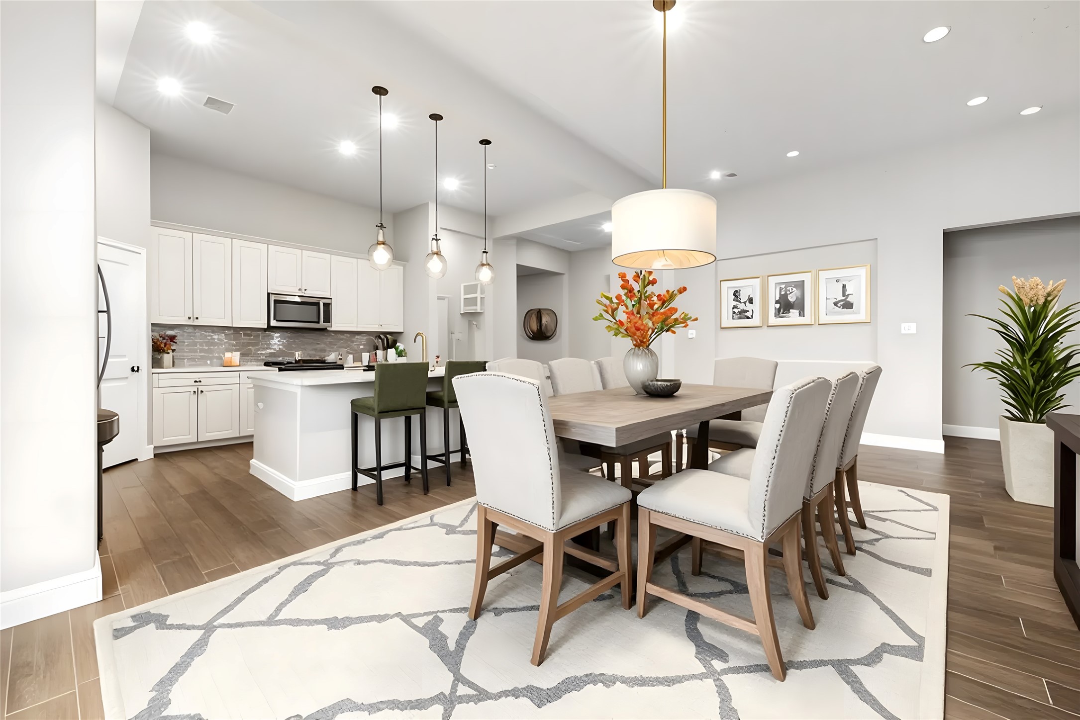 2004 Sadtler Ridge Circle La Porte, TX 77571 - Photo 9 of 23 a kitchen with kitchen island granite countertop a table and chairs in it