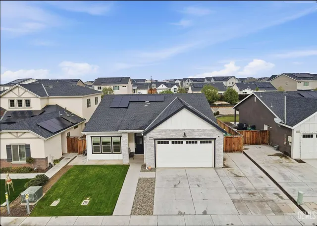 a view of house with yard