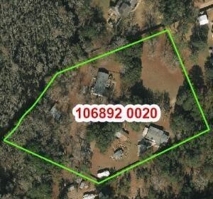 1848 New Berlin Road Jacksonville, FL 32218 - Photo 1 of 1 a street sign on a pole on a road