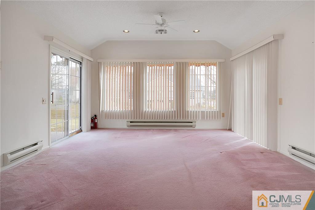 793 Pompton Road, Unit D Monroe Township, NJ 08831 - Photo 17 of 23 a view of an empty room with a window