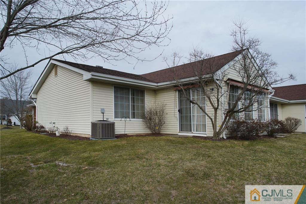 793 Pompton Road, Unit D Monroe Township, NJ 08831 - Photo 18 of 23 a front view of house with yard