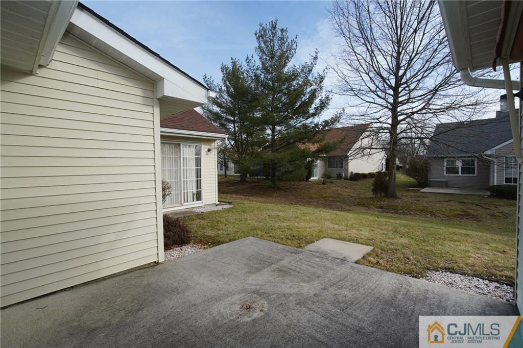 793 Pompton Road, Unit D Monroe Township, NJ 08831 - Photo 21 of 23 a view of a house with a yard