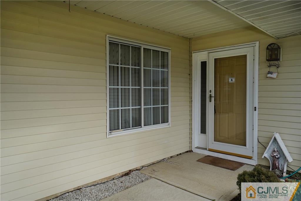 793 Pompton Road, Unit D Monroe Township, NJ 08831 - Photo 4 of 23 a view of front door of a house