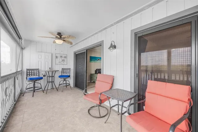 an aerial view of a house with a ocean view