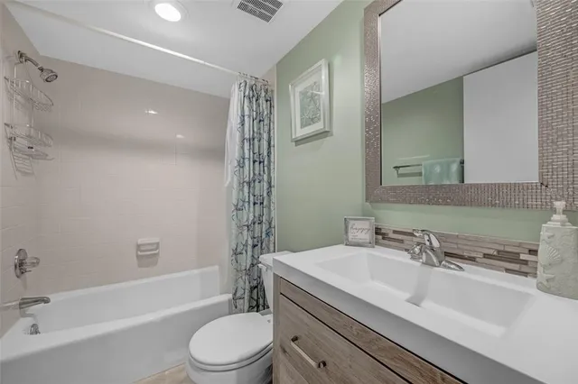 a view of a lake in middle of a town