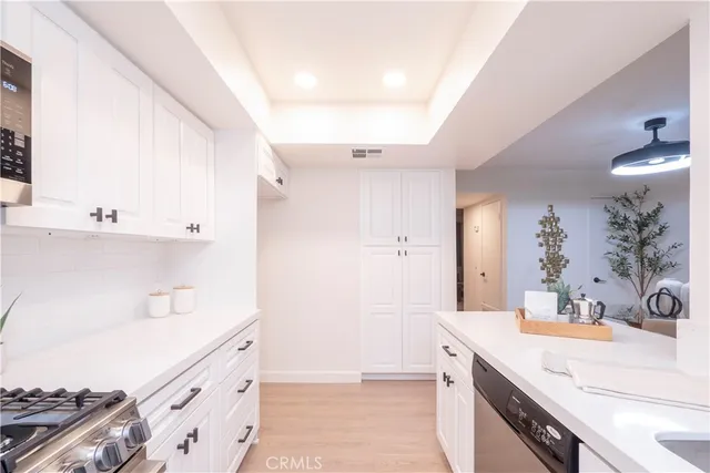 a bathroom with a sink a vanity and a mirror