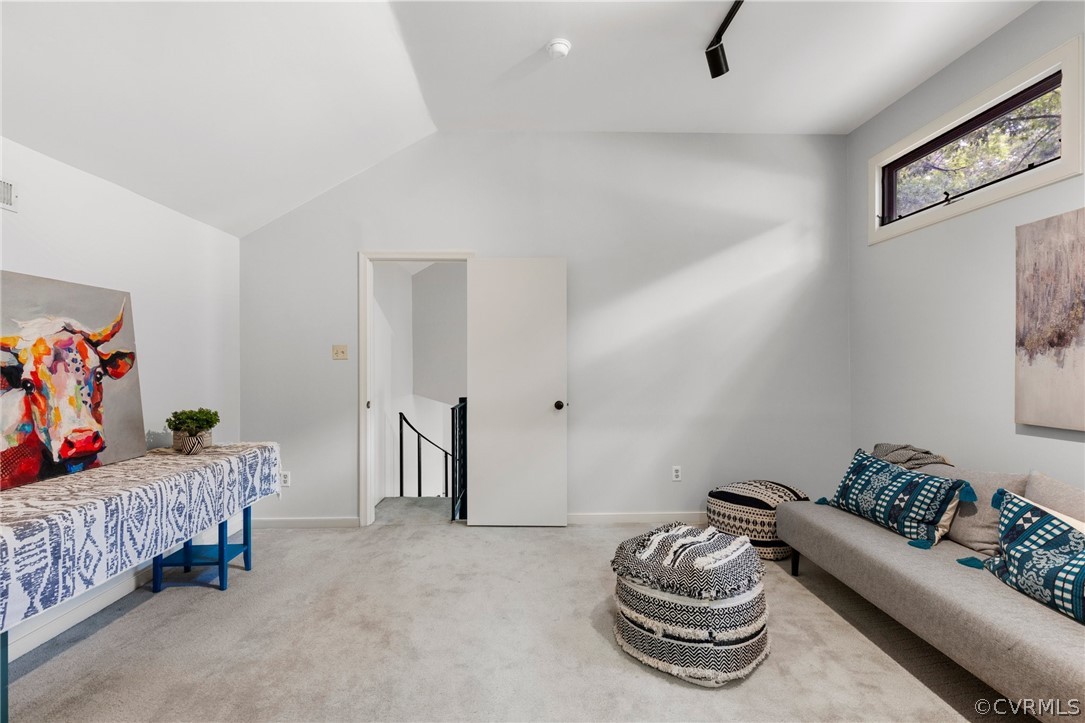 12836 Ashtree Road Midlothian, VA 23114 - Photo 26 of 32 a bedroom with a bed and a couch