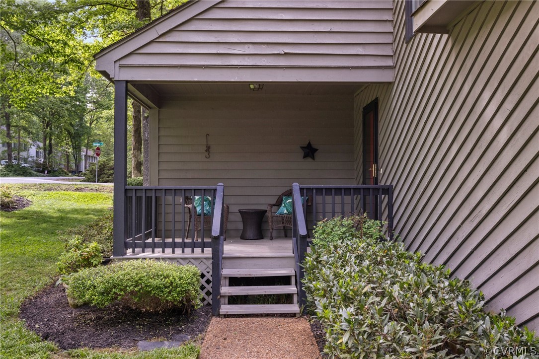 12836 Ashtree Road Midlothian, VA 23114 - Photo 3 of 32 a front view of a house with garden