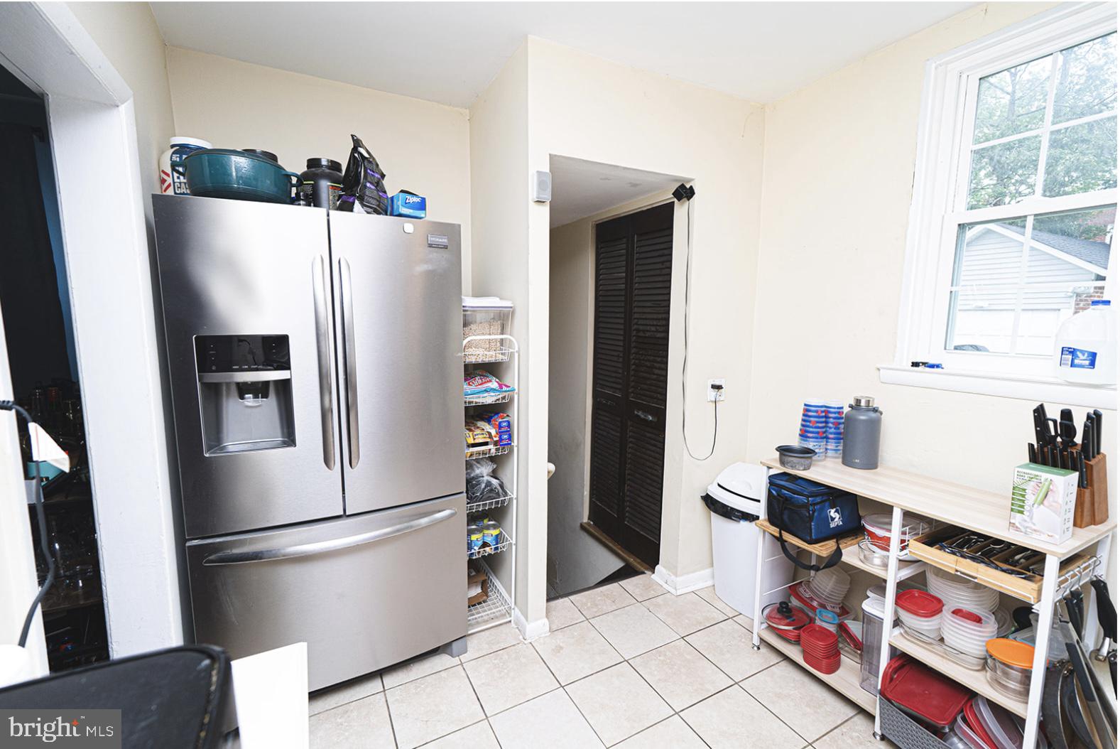 3224 Marshall Road Drexel Hill, PA 19026 - Photo 14 of 24 a kitchen with stainless steel appliances a refrigerator and a sink