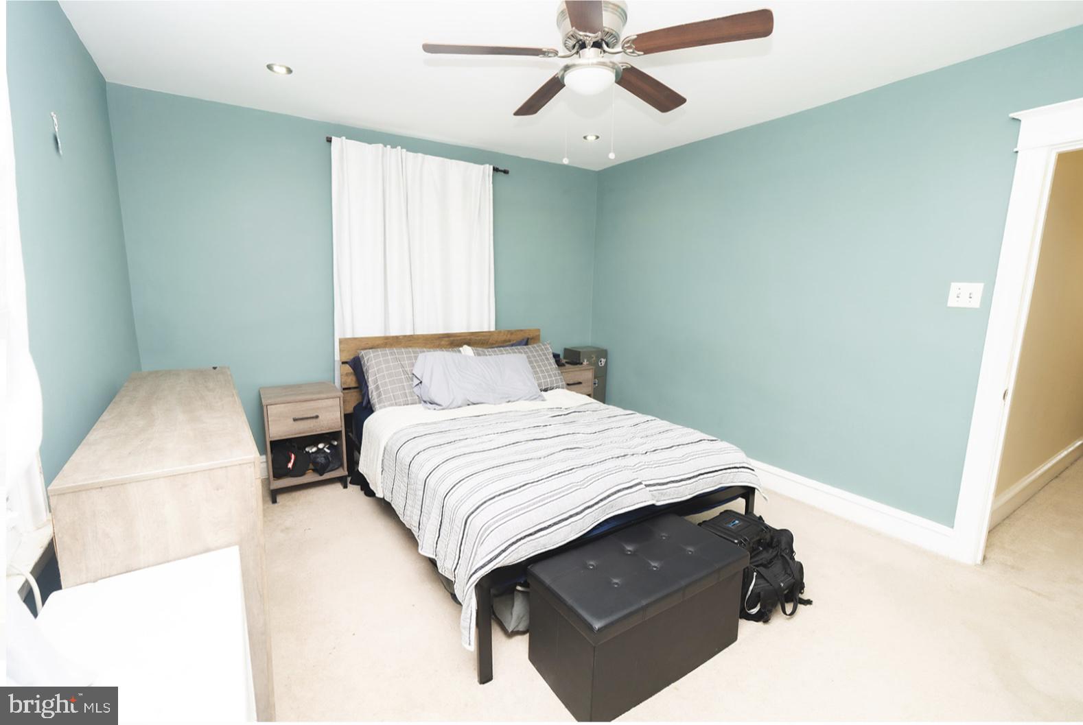 3224 Marshall Road Drexel Hill, PA 19026 - Photo 16 of 24 a bedroom with a bed and window