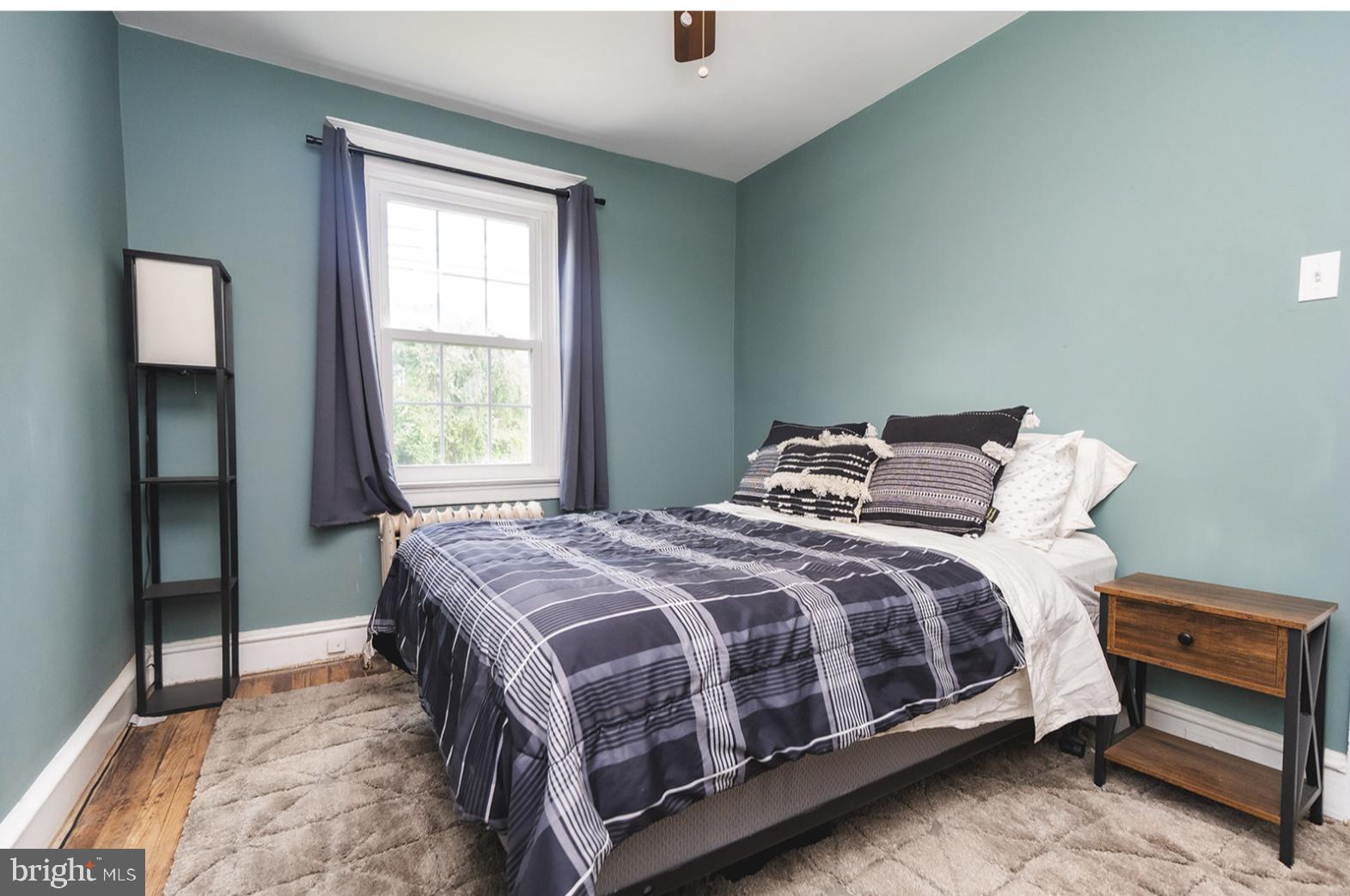 3224 Marshall Road Drexel Hill, PA 19026 - Photo 19 of 24 a bedroom with a bed and a window