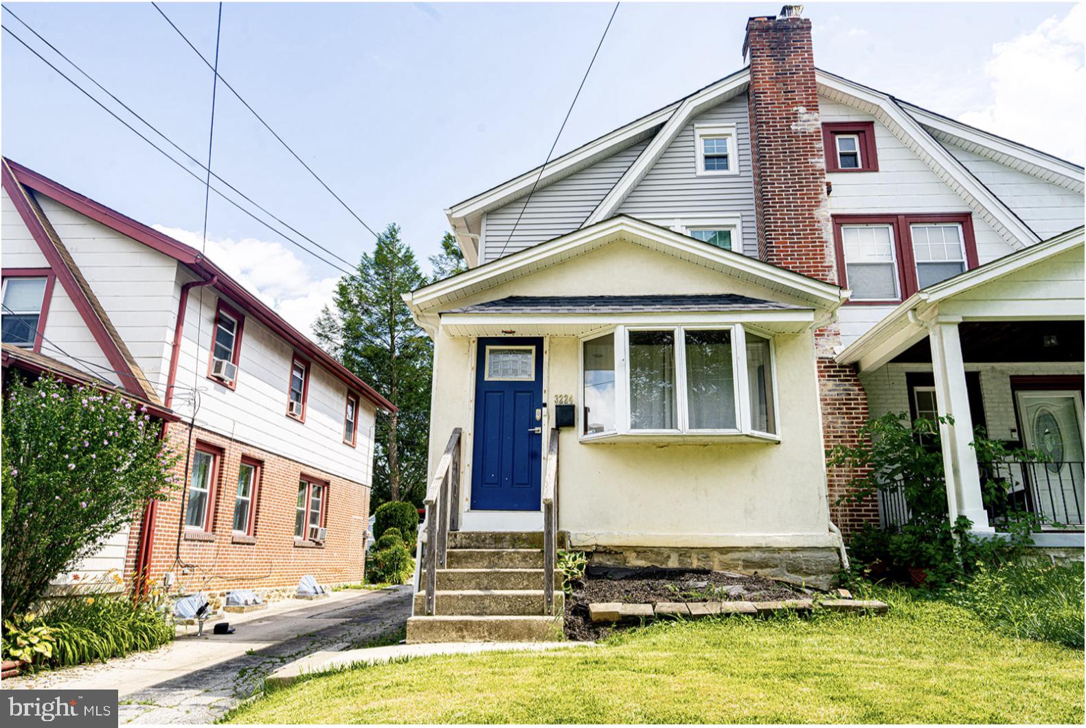 3224 Marshall Road Drexel Hill, PA 19026 - Photo 2 of 24 a view of a white house with swimming pool in front of it