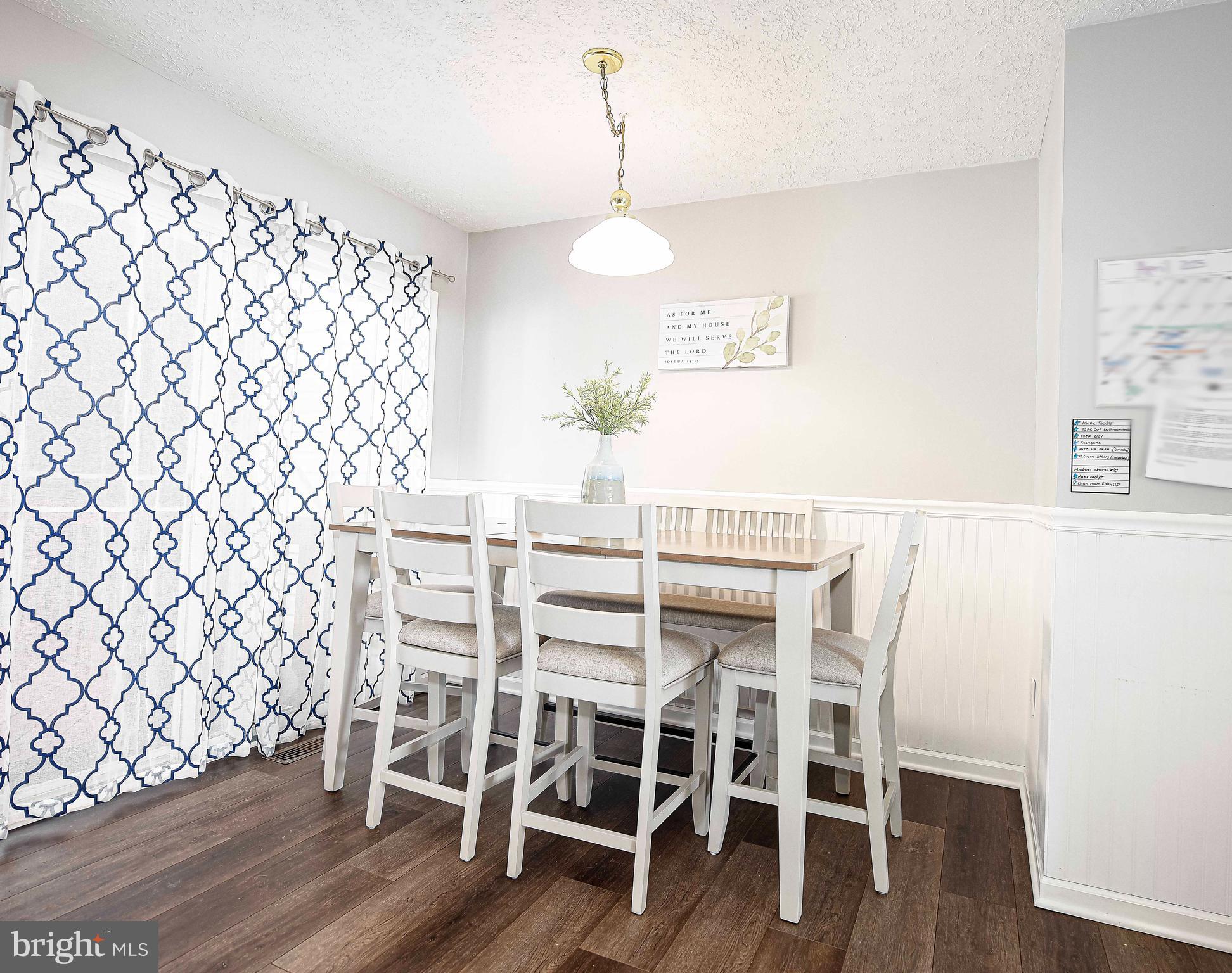 518 MacIntosh Circle Joppa, MD 21085 - Photo 12 of 29 a dining room with furniture and wooden floor