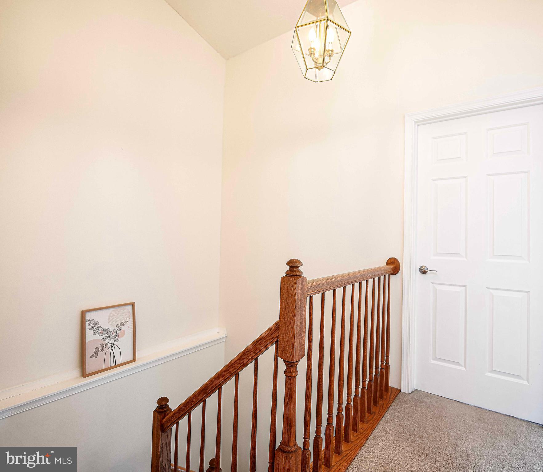 518 MacIntosh Circle Joppa, MD 21085 - Photo 14 of 29 a view of a hallway with wooden floor