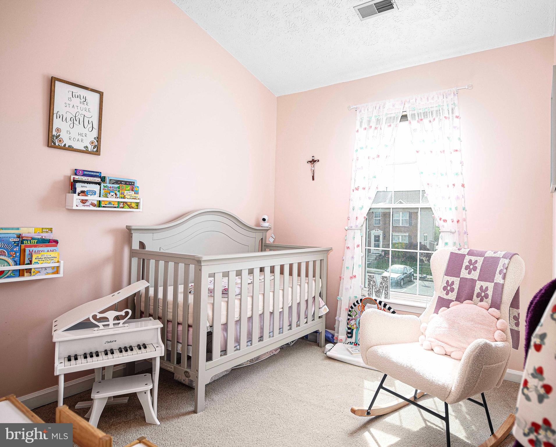 518 MacIntosh Circle Joppa, MD 21085 - Photo 19 of 29 a bedroom with furniture and a window