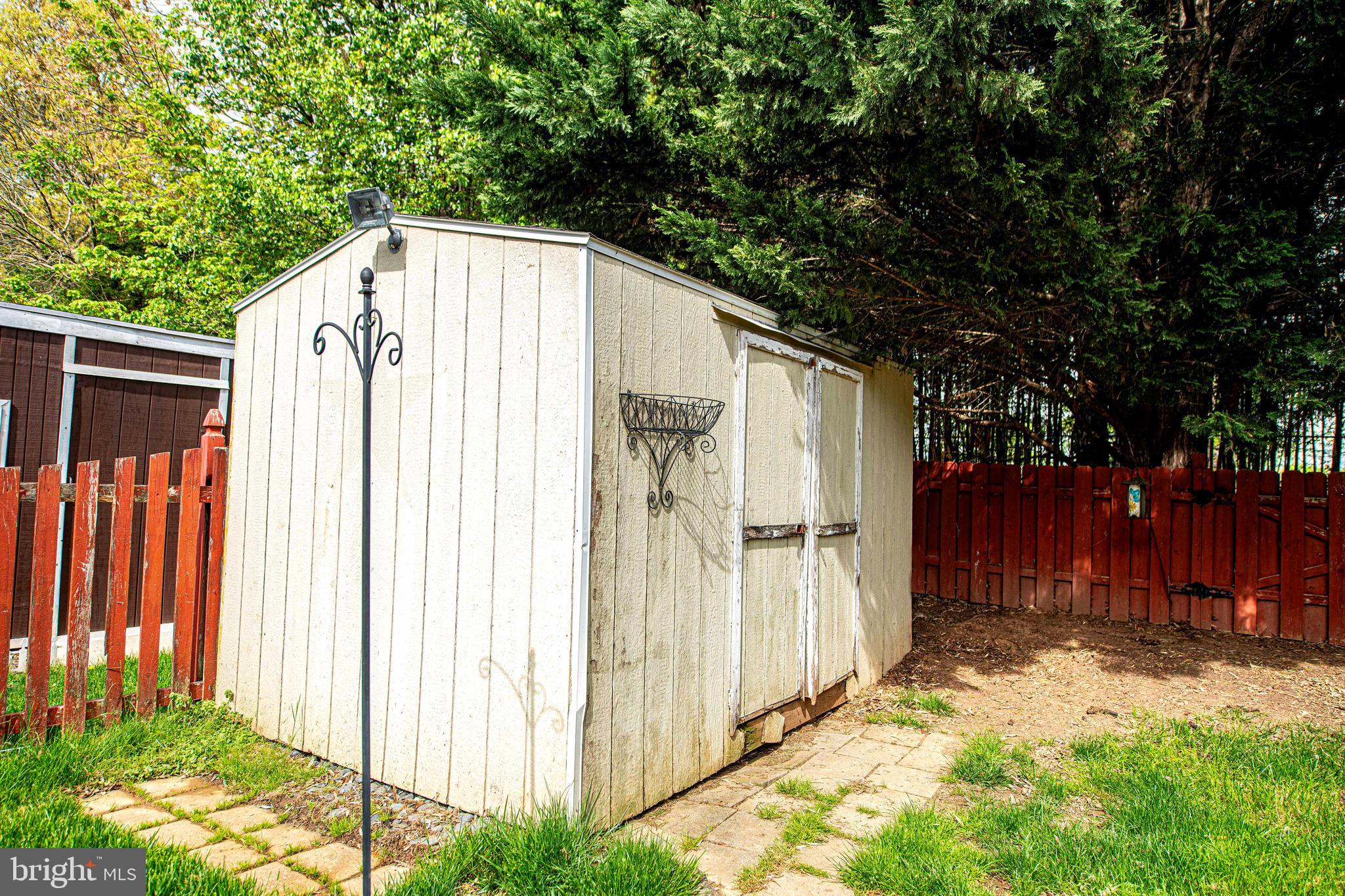 518 MacIntosh Circle Joppa, MD 21085 - Photo 27 of 29 a view of a house with backyard and tree