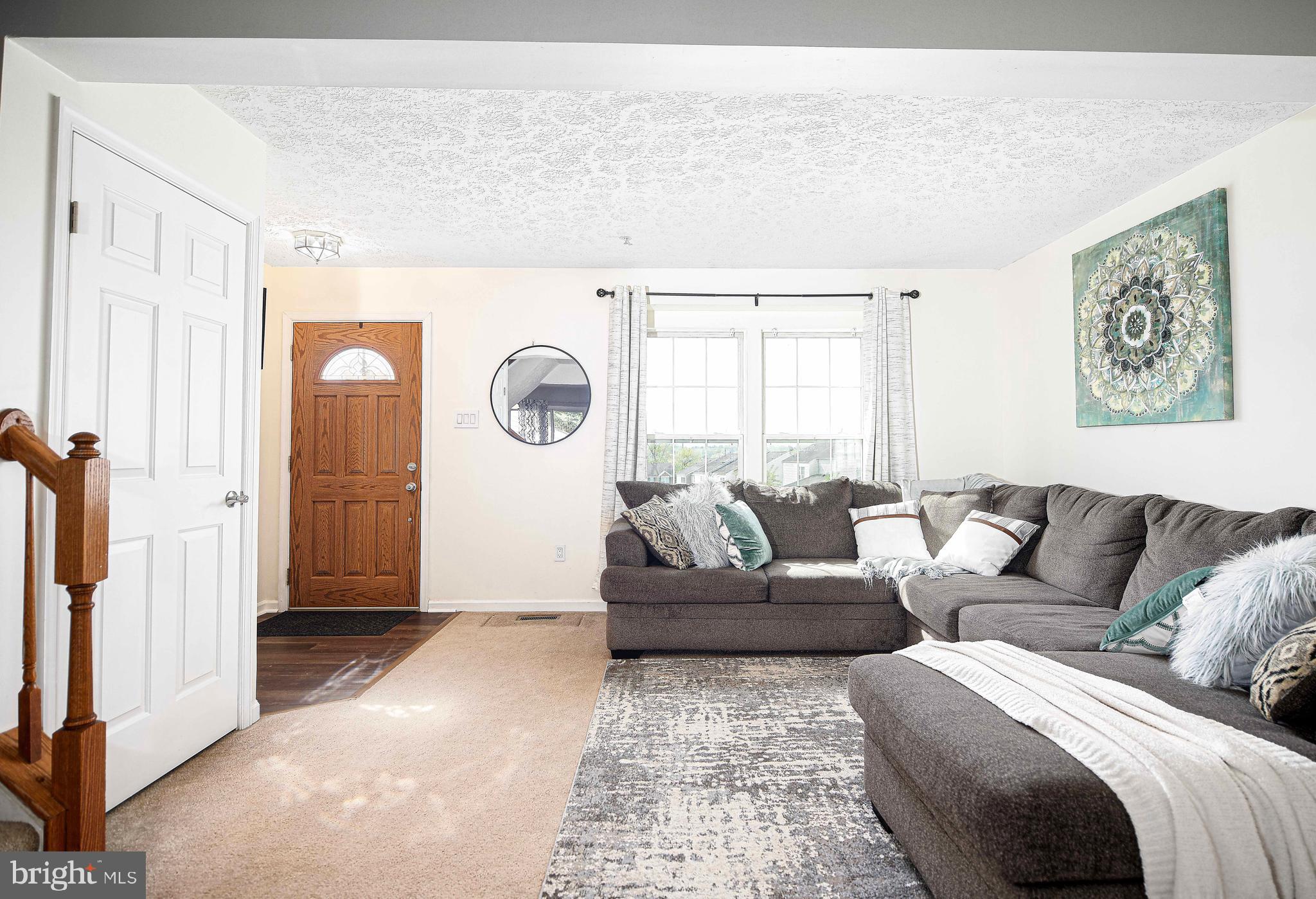 518 MacIntosh Circle Joppa, MD 21085 - Photo 5 of 29 a living room with couches and a large window