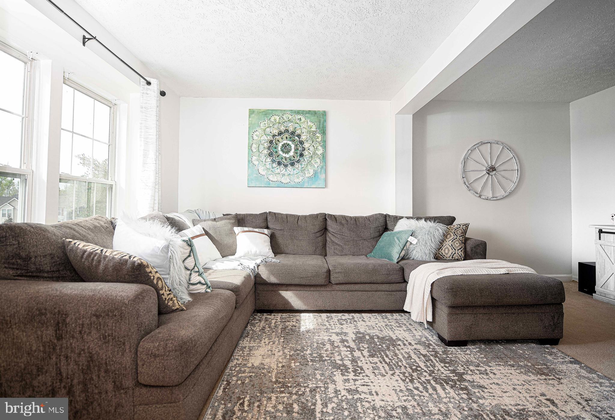 518 MacIntosh Circle Joppa, MD 21085 - Photo 6 of 29 a living room with furniture and a large window