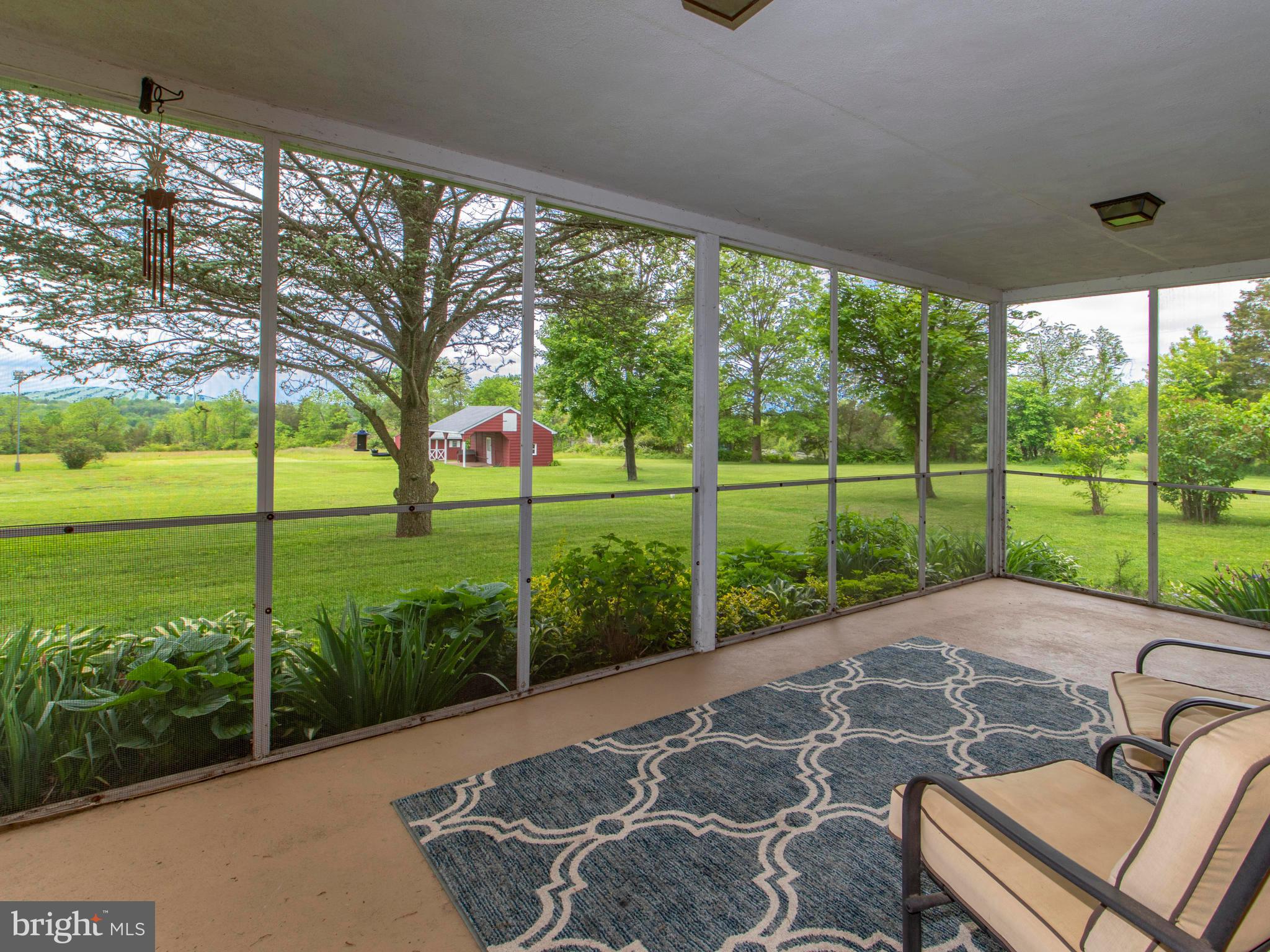 3314 Little Road Perkiomenville, PA 18074 - Photo 22 of 40 Covered screened porch