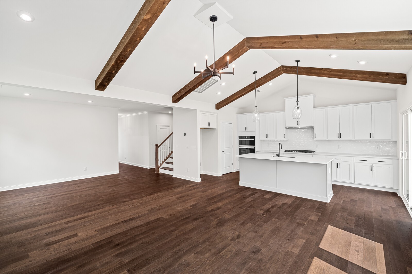 1040 Cherry Tree Drive Mount Juliet, TN 37122 - Photo 14 of 47 a view of a kitchen with wooden floor and electronic appliances