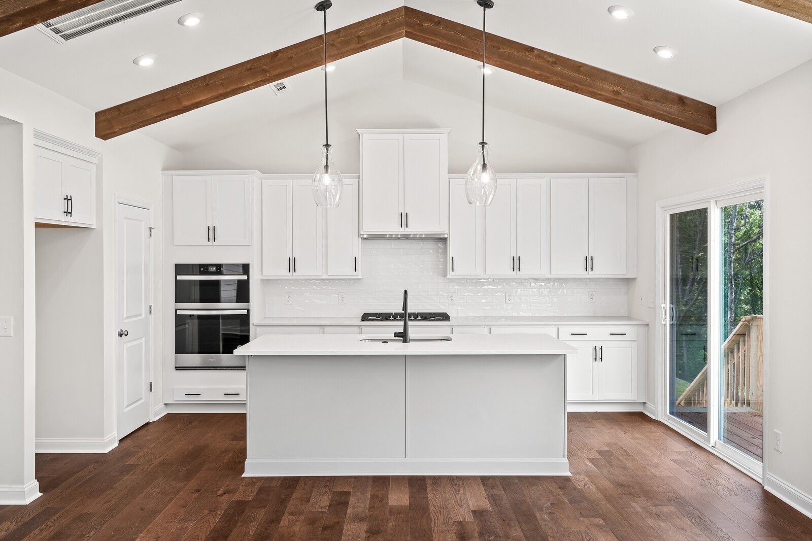 1040 Cherry Tree Drive Mount Juliet, TN 37122 - Photo 16 of 47 a kitchen with kitchen island a sink stainless steel appliances and cabinets