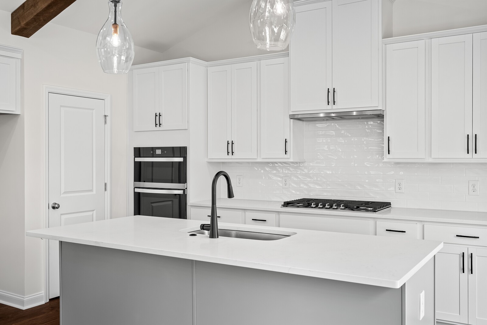 1040 Cherry Tree Drive Mount Juliet, TN 37122 - Photo 18 of 47 a kitchen with stainless steel appliances a sink a stove a microwave and cabinets