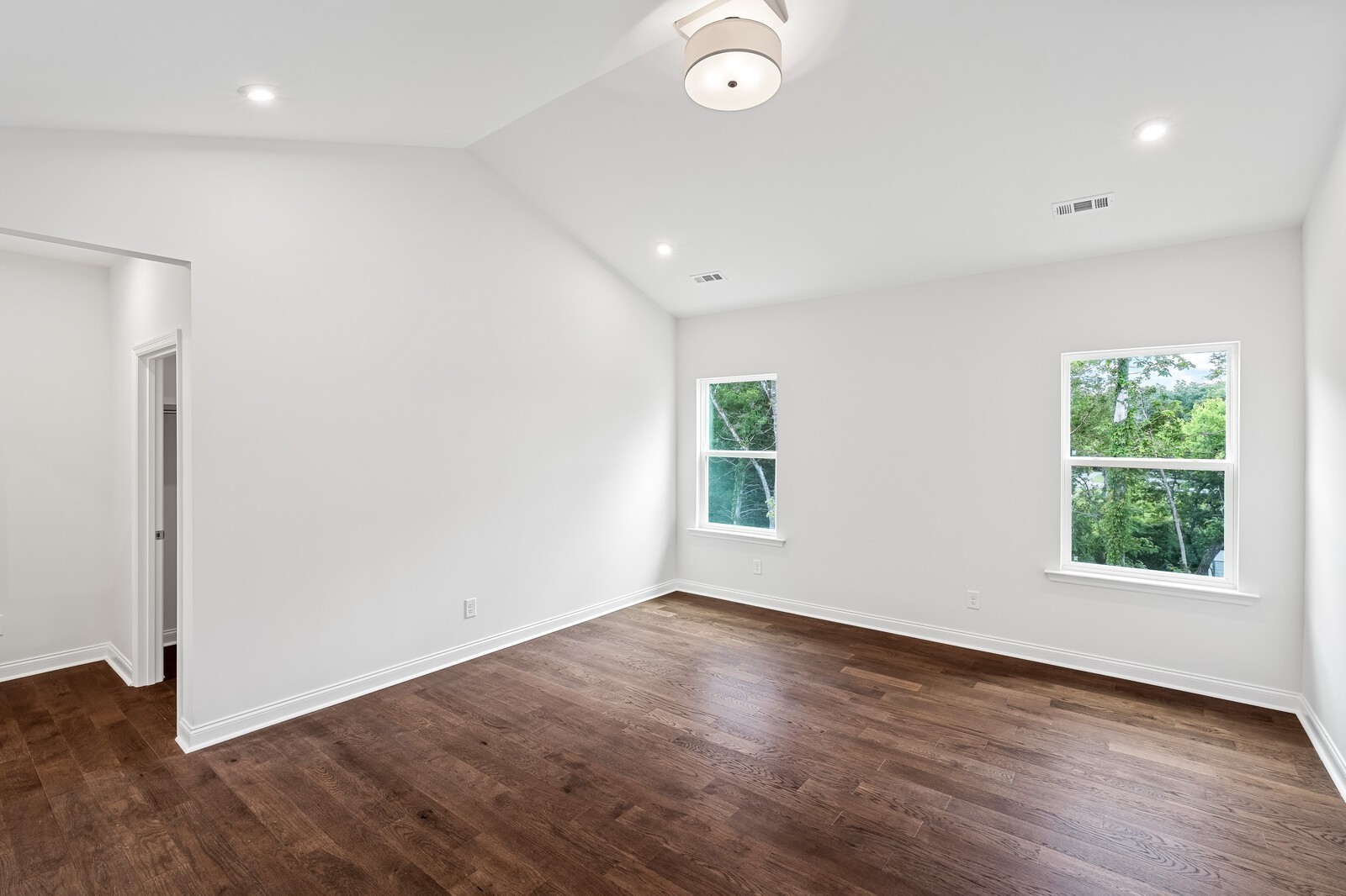 1040 Cherry Tree Drive Mount Juliet, TN 37122 - Photo 24 of 47 an empty room with wooden floor and windows