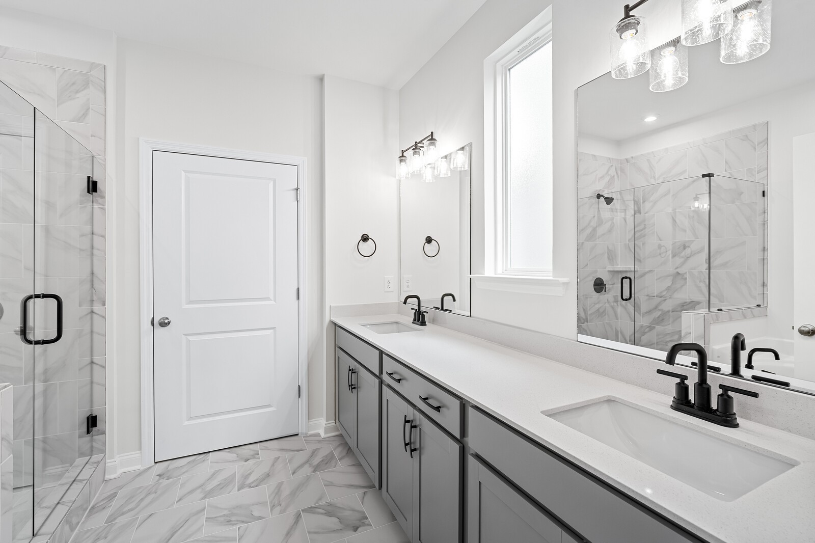 1040 Cherry Tree Drive Mount Juliet, TN 37122 - Photo 27 of 47 a bathroom with a sink double vanity granite tub shower and a mirror