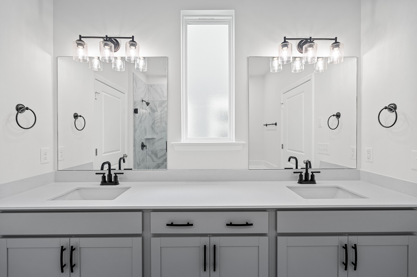 1040 Cherry Tree Drive Mount Juliet, TN 37122 - Photo 28 of 47 a bathroom with double sink and mirror