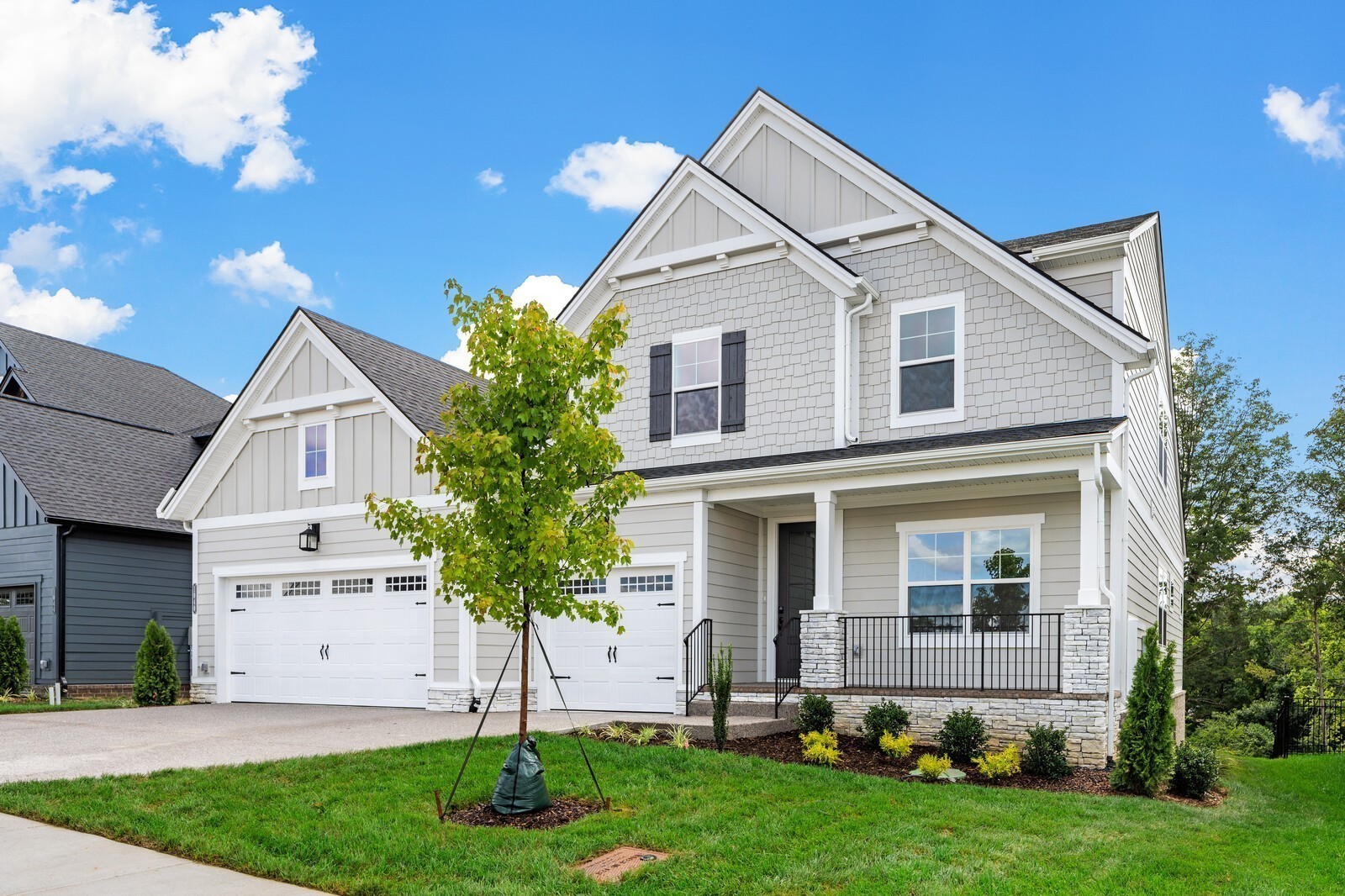 1040 Cherry Tree Drive Mount Juliet, TN 37122 - Photo 3 of 47 a front view of a house with a yard and trees