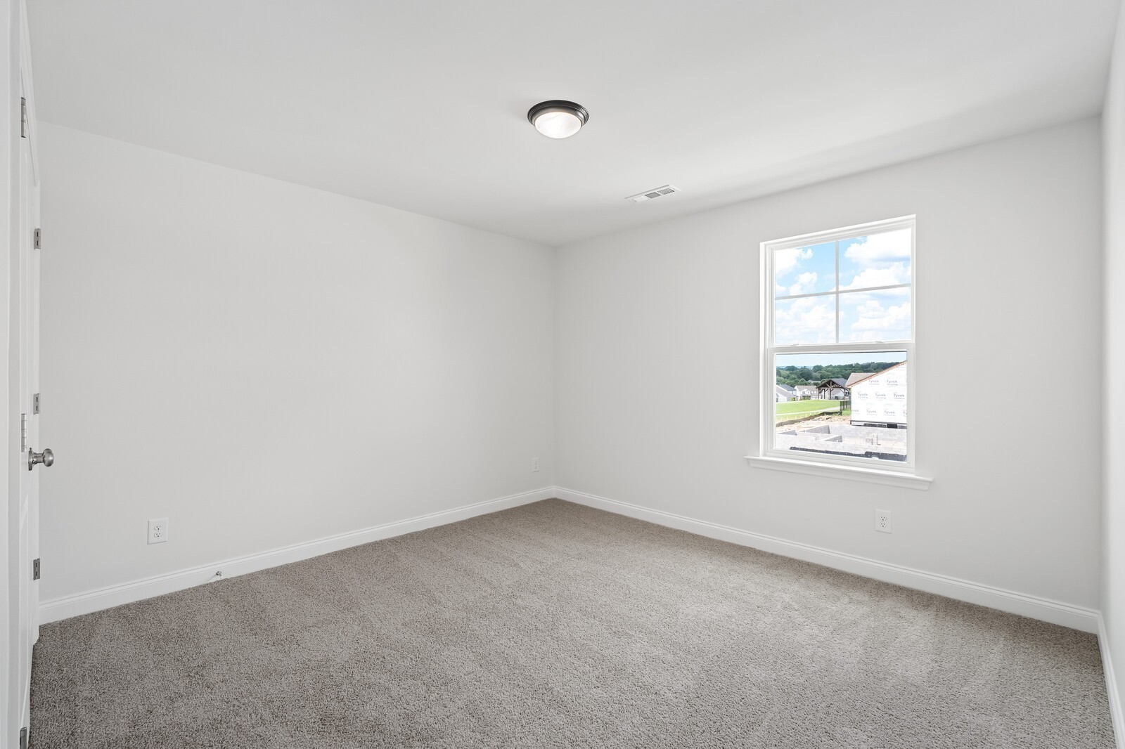 1040 Cherry Tree Drive Mount Juliet, TN 37122 - Photo 37 of 47 an empty room with a window