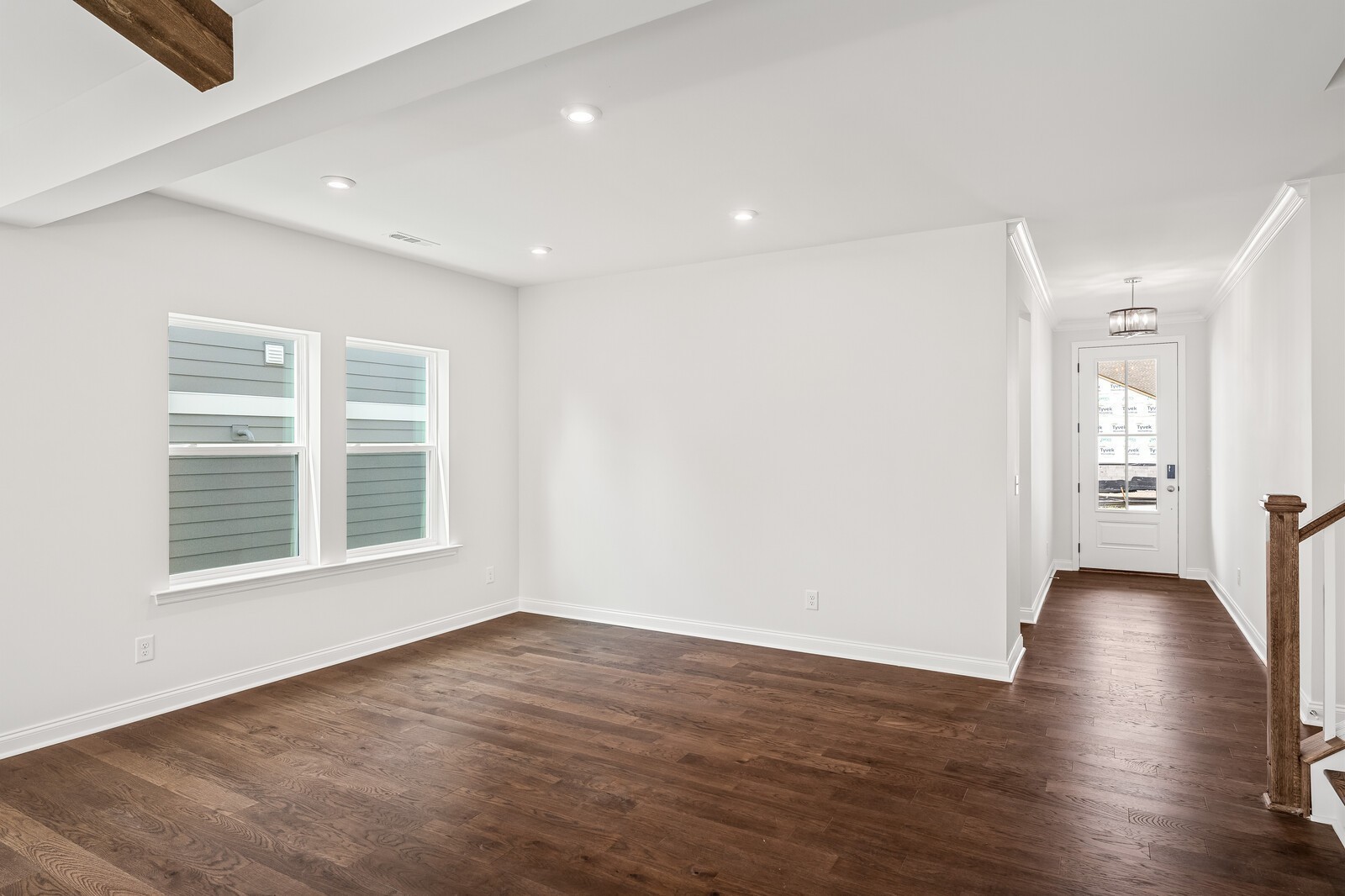 1040 Cherry Tree Drive Mount Juliet, TN 37122 - Photo 9 of 47 a view of an empty room with wooden floor and a window