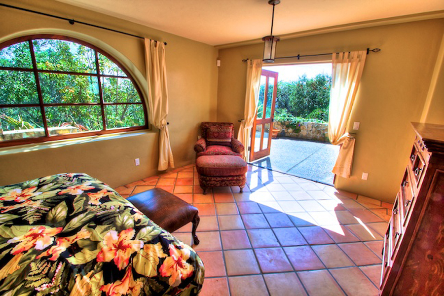 1010 Garcia Road Santa Barbara, CA 93103 - Photo 13 of 20 a bedroom with a bed and window