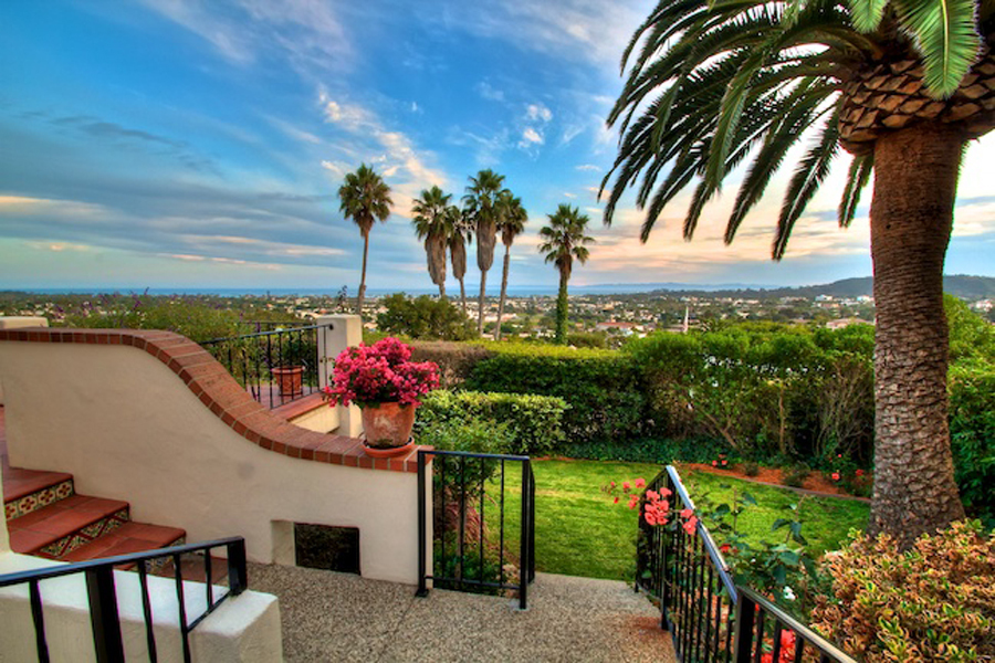 1010 Garcia Road Santa Barbara, CA 93103 - Photo 2 of 20 a front view of a house with a yard and mountain view