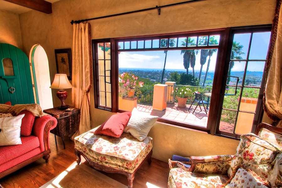 1010 Garcia Road Santa Barbara, CA 93103 - Photo 4 of 20 a living room with furniture and a large window