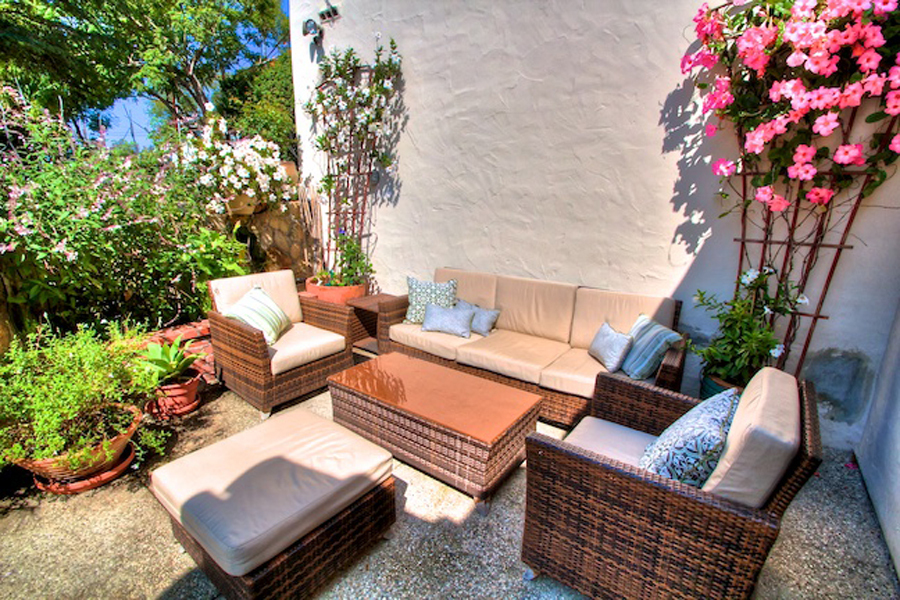 1010 Garcia Road Santa Barbara, CA 93103 - Photo 7 of 20 a outdoor living space with furniture and a potted plant