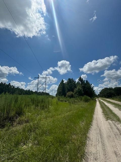 Southwest Coles Court Fort White, FL 32038 - Photo 12 of 34 a view of a lake with a yard